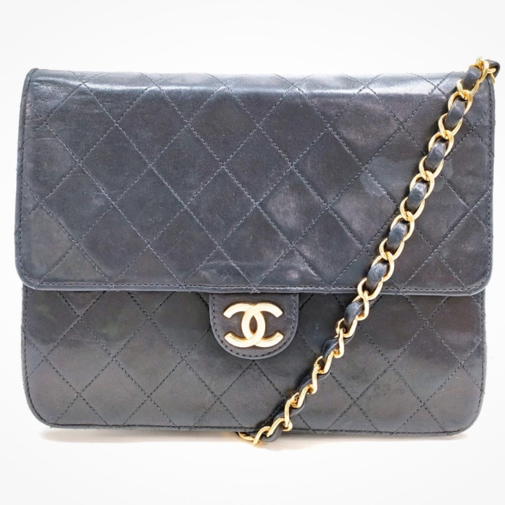 CHANEL Quilted Black Leather Bag with Gold Chain